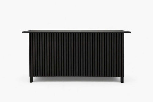 Black slatted panel desk featuring vertical slatted wooden panels and a sleek black finish, ideal for modern interiors.